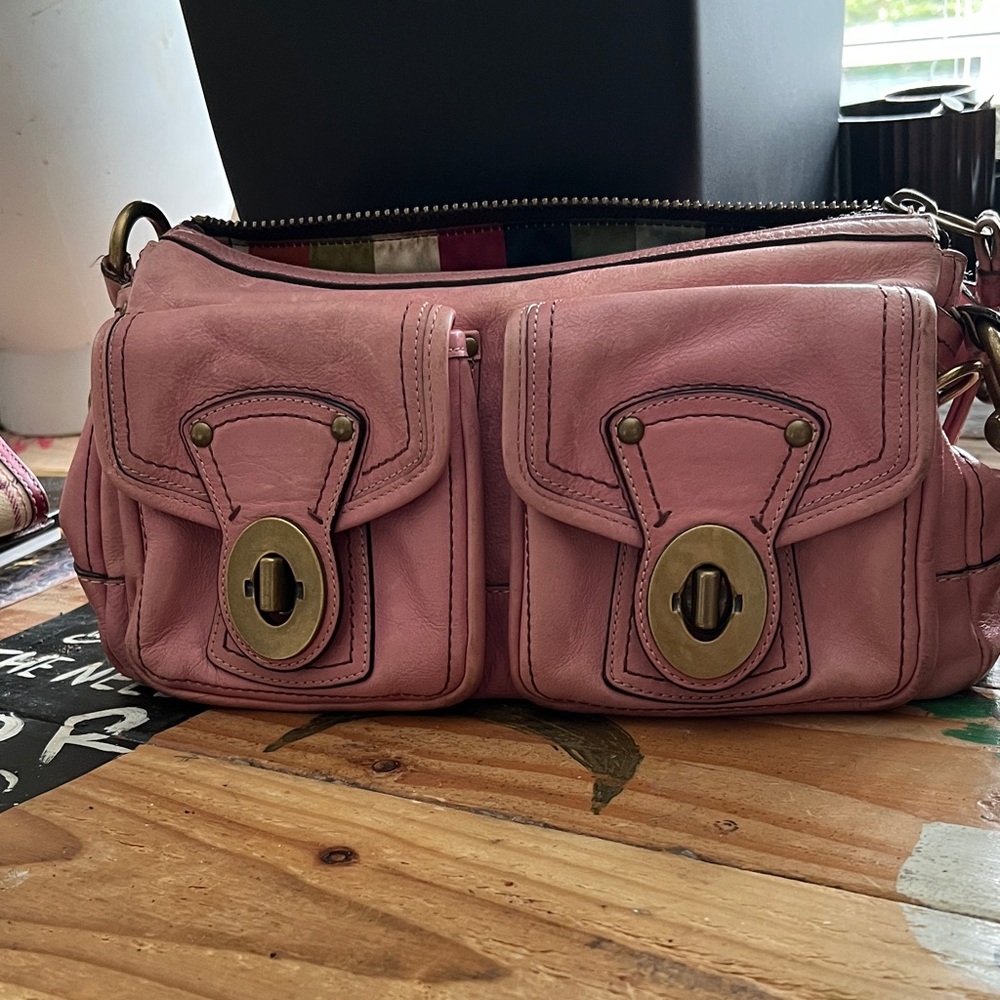 Elegant Pink Crossbody Bag with Brass Accents